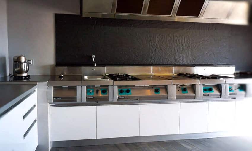 Modern kitchen with industrial gas burner stove