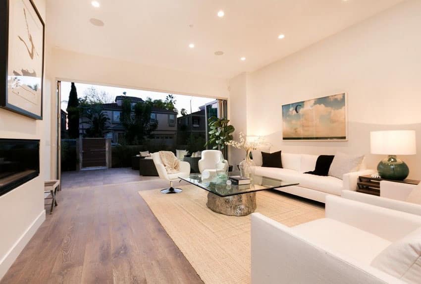 Modern living room with retractable doors to outdoor patio