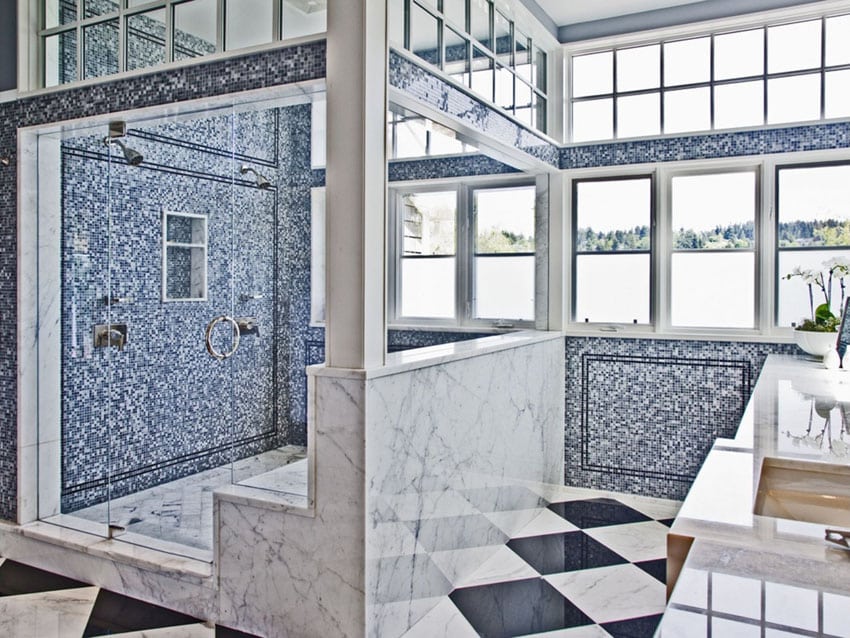 Mosaic and marble shower with lake views