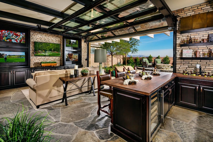 Open air home bar with retractable door to patio