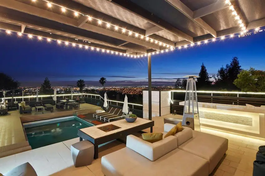 Patio with amazing city views and canopy with hanging lights