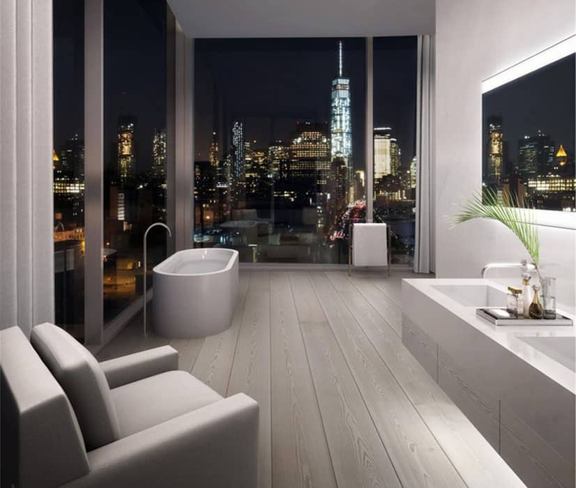 Penthouse apartment bathroom with city views from bathtub
