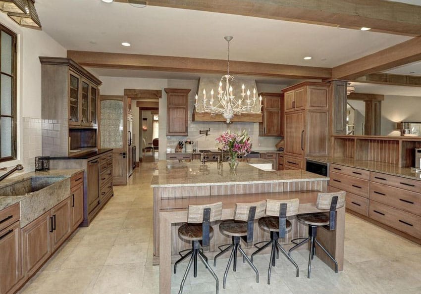 Flat panel solid wood cabinet, limestone floors and marble countertops