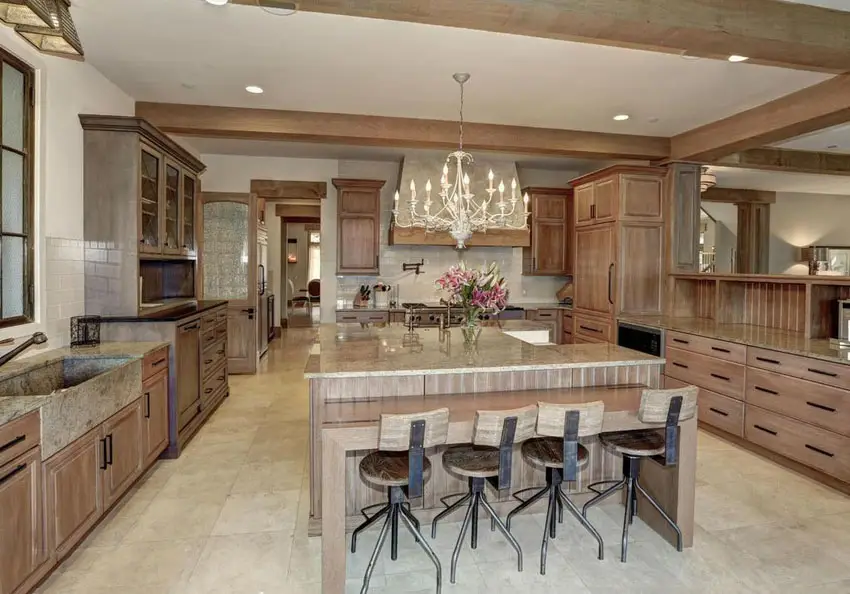 Solid wood cabinet kitchen with breakfast bar dining island and chandelier