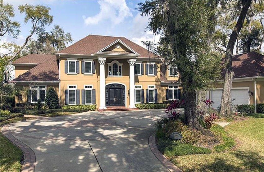 Southern colonial style house with three car garage