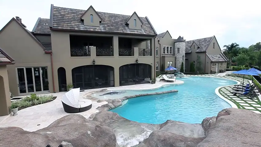 Swimming pool behind modern estate home