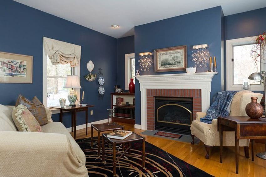 tradiitonal living room with fireplace and painted blue walls