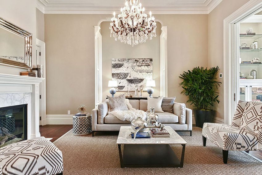 Traditional formal living room with chandelier and fireplace