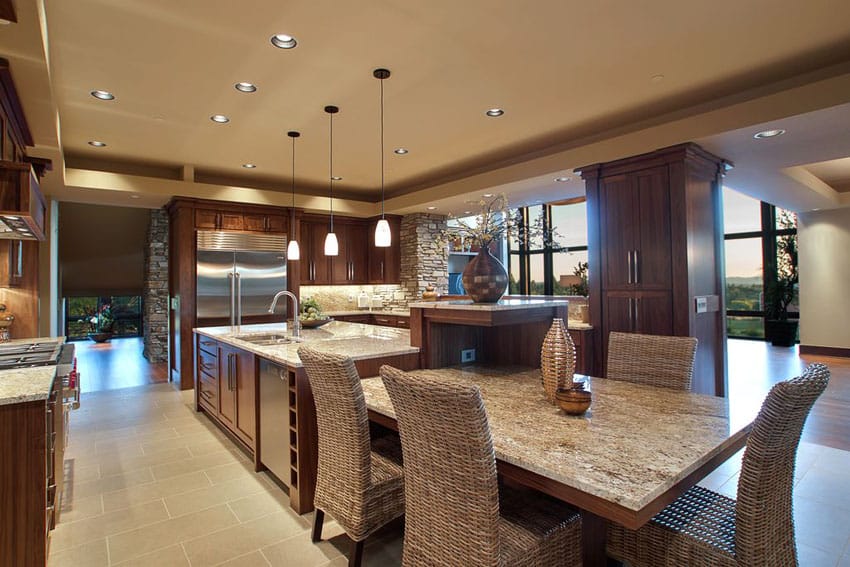 Traditional kitchen with almond gold granite and end breakfast bar