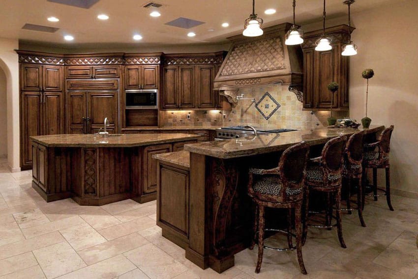 Kitchen with granite bar, porcelain floor tiles and decorative moldings