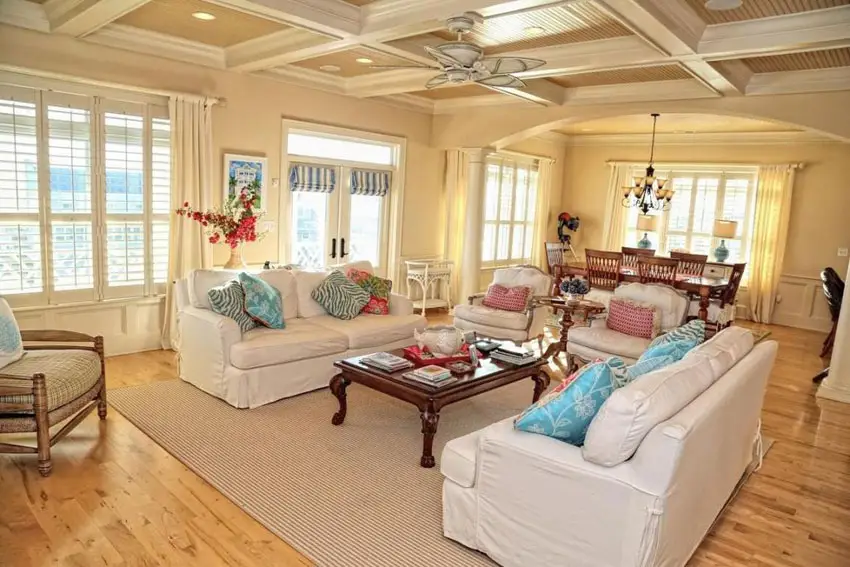 Stylish living room with high tray ceiling with interesting pattern