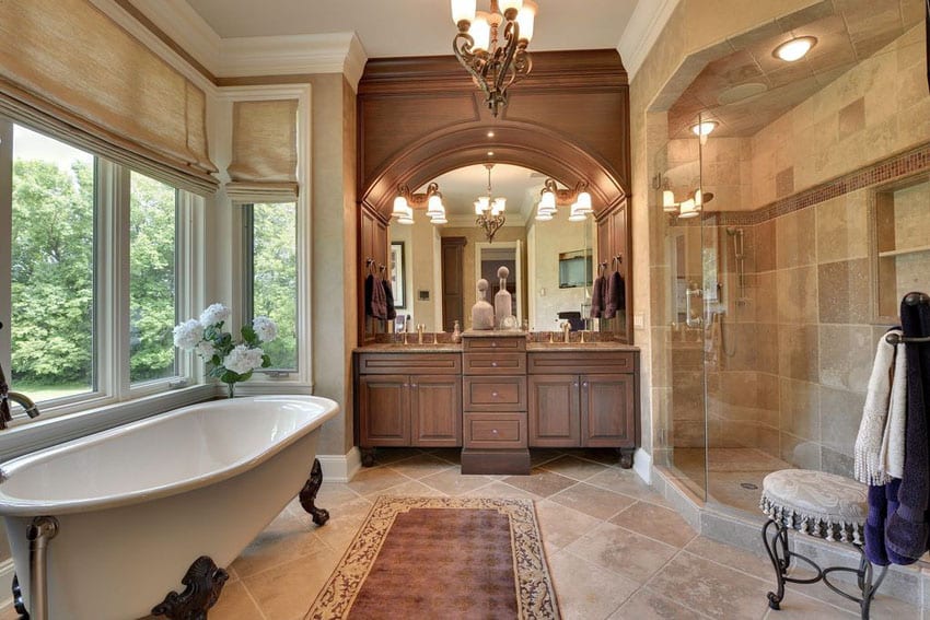 Traditional master bathroom with cast iron clawfoot tub with lion paw feet