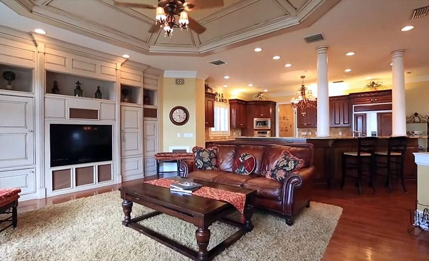 Transitional living room with cream built in entertainment center