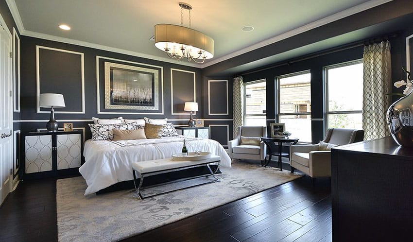 Art deco master bedroom with dark color scheme and wood floors