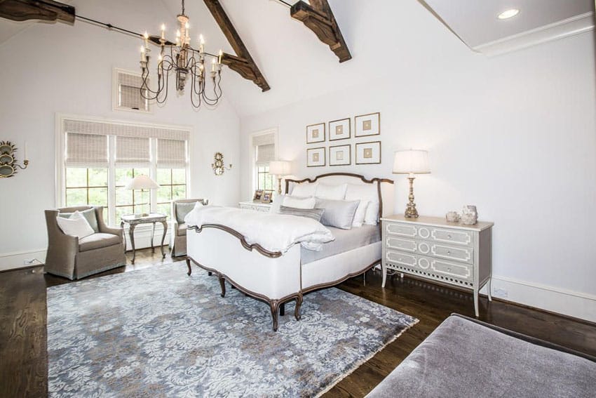 Beautiful bedroom with vaulted ceilings and brown accents