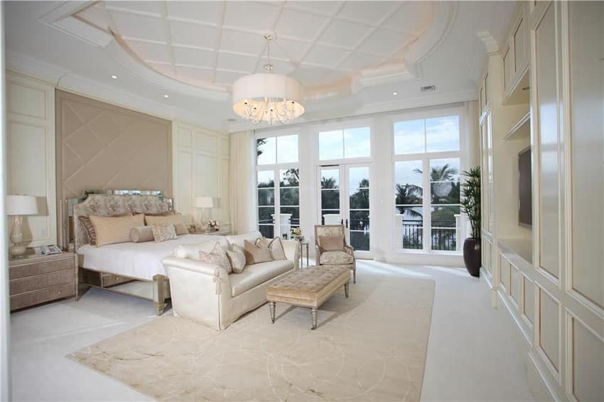 Bedroom with luxury finishes and balcony views