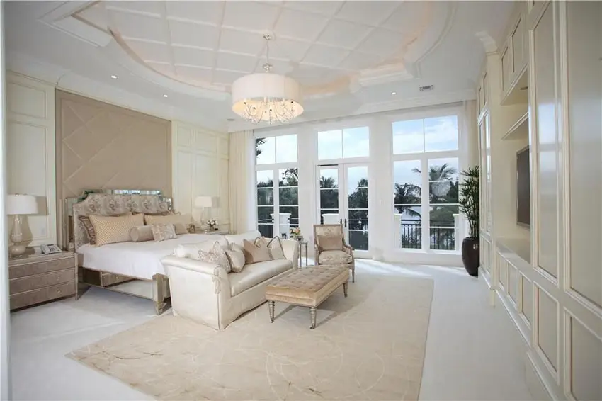 Bedroom with luxury finishes and balcony views