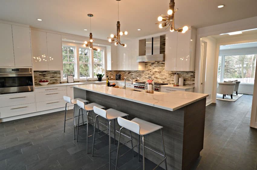 Contemporary kitchen with high gloss white cabinets and felix bar stools