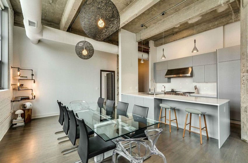 Contemporary and industrial design, gray cabinetry and concrete ceiling