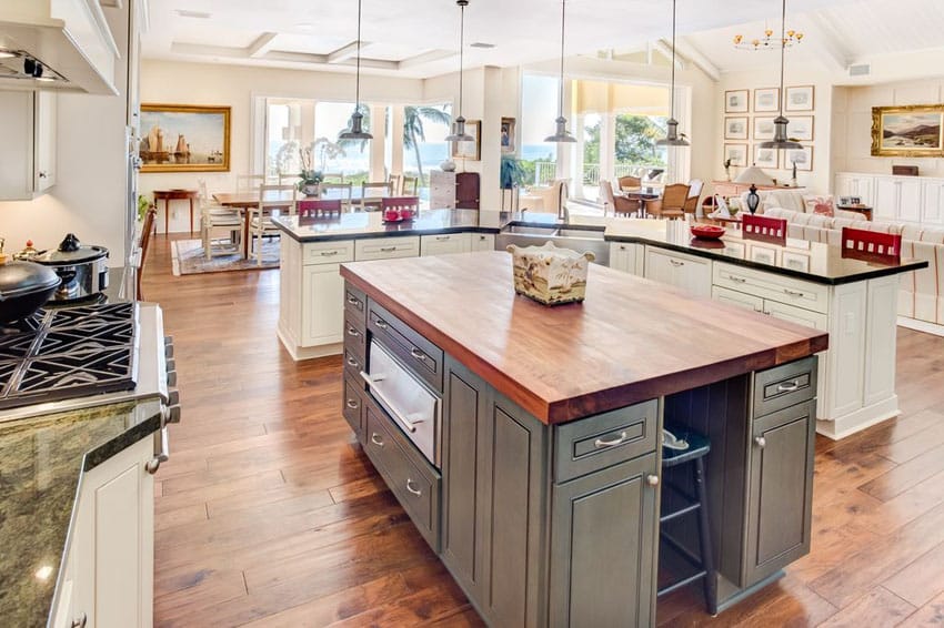 Kitchen with wood counter and granite breakfast island