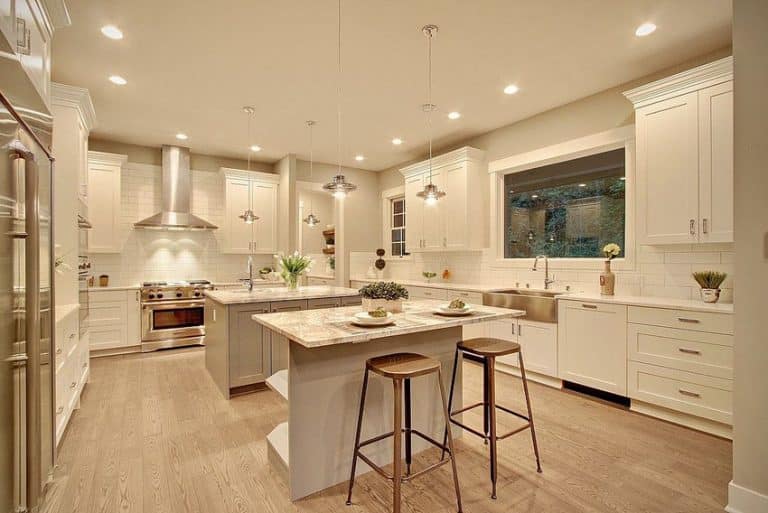 Double Island Transitional Kitchen With Calacatta Gold Marble Countertops And White Cabinets 768x513 
