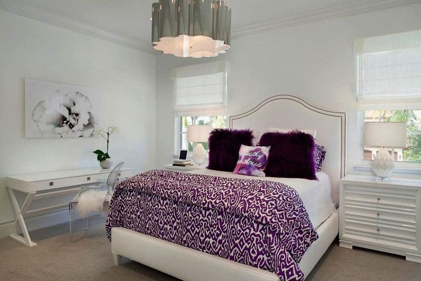 Eclectic white bedroom with drum pendant light and purple accent colors
