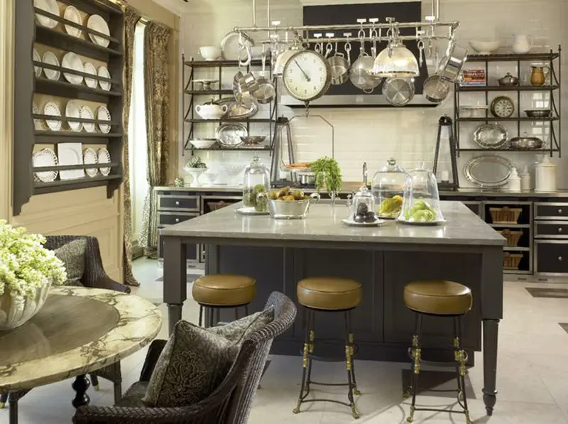 Kitchen with large island with round bar stool seating