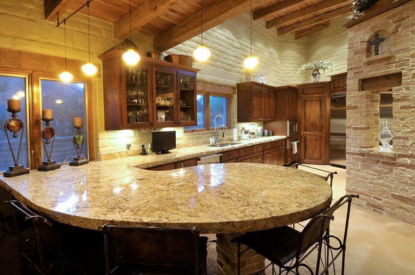 Kitchen with peninsula and new venetian gold granite counter