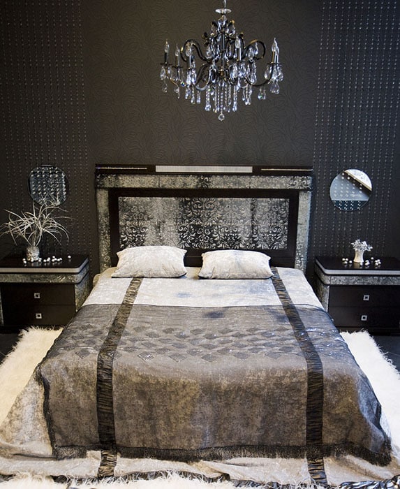 Luxury black decorated bedroom with chandelier