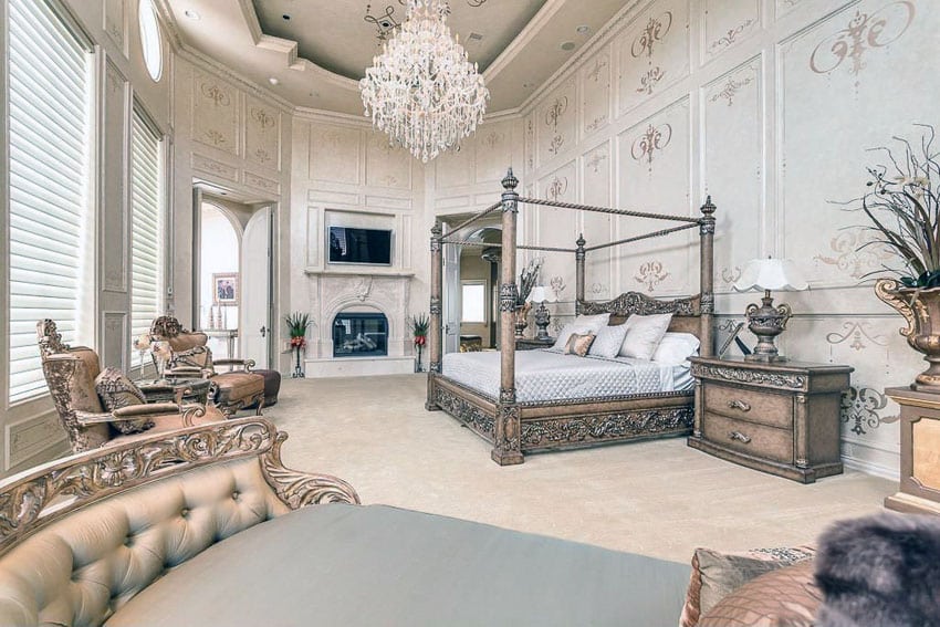 Luxury traditional master bedroom with gilded bed frame, high ceilings and crystal chandelier
