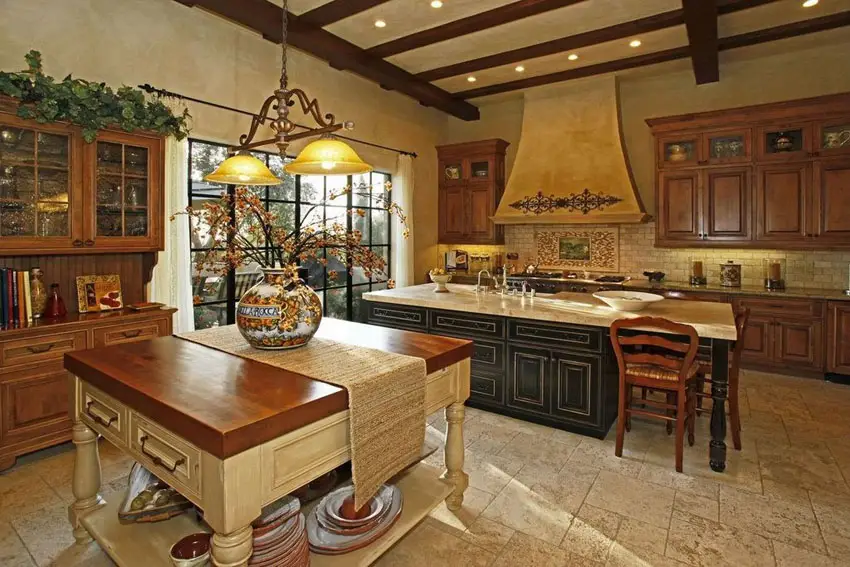 Country style kitchen with crema cappuccino marble island and travertine floors