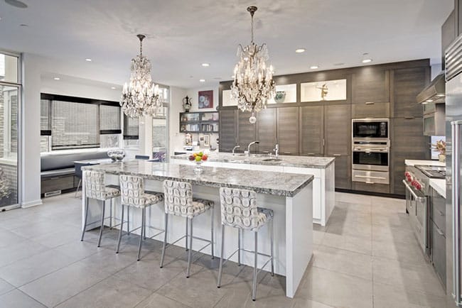 Kitchen with double island kitchen with upholstered chairs