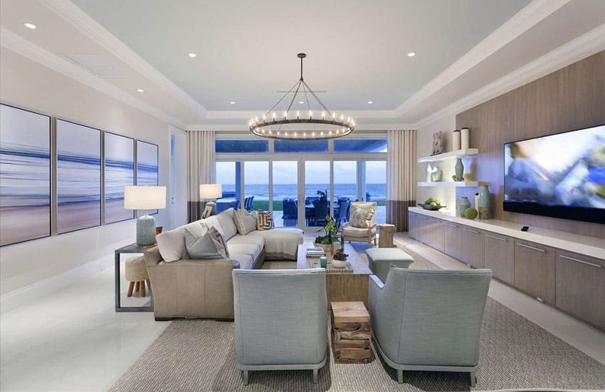Ocean view living room with contemporary design and circular chandelier