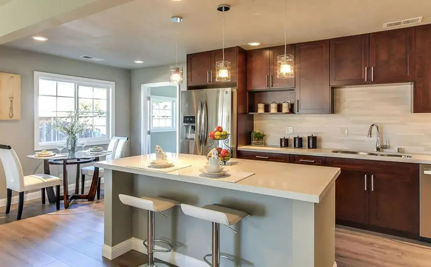 Open contemporary kitchen with dining nook and breakfast bar