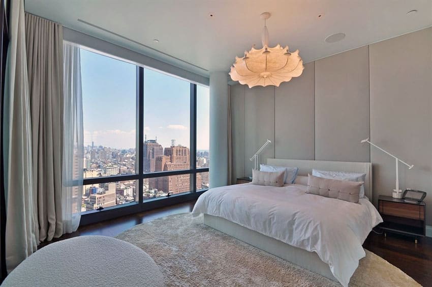 Penthouse apartment bedroom with contemporary chandelier