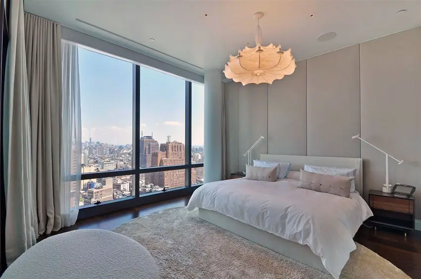 Penthouse apartment bedroom with picture window