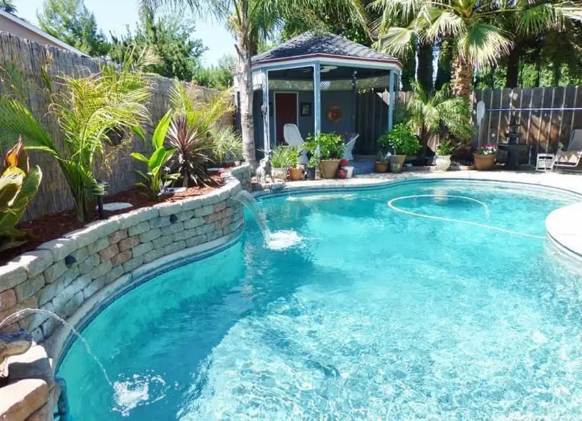 Swimming pool gazebo in backyard