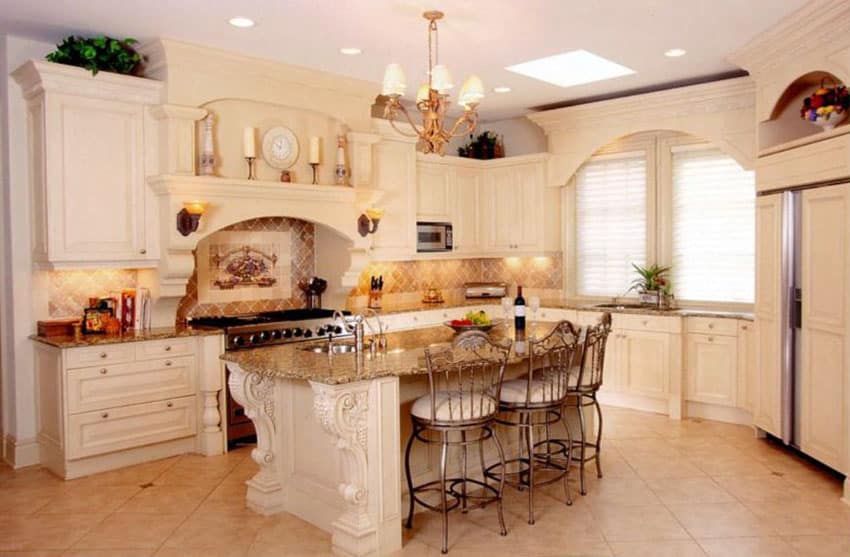 Traditional kitchen with cream color cabinets, decorative wood island and ceramic tile floors