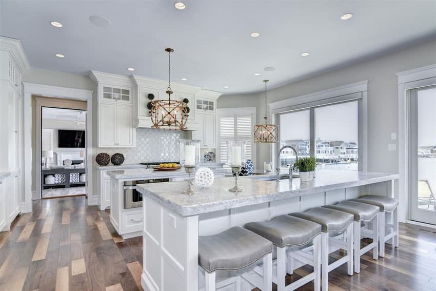 Transitional Kitchen With Double Islands With Breakfast Bar And Walnut Hardwood Flooring 