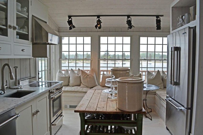 Cottage style kitchen with portable reclaimed wood style island