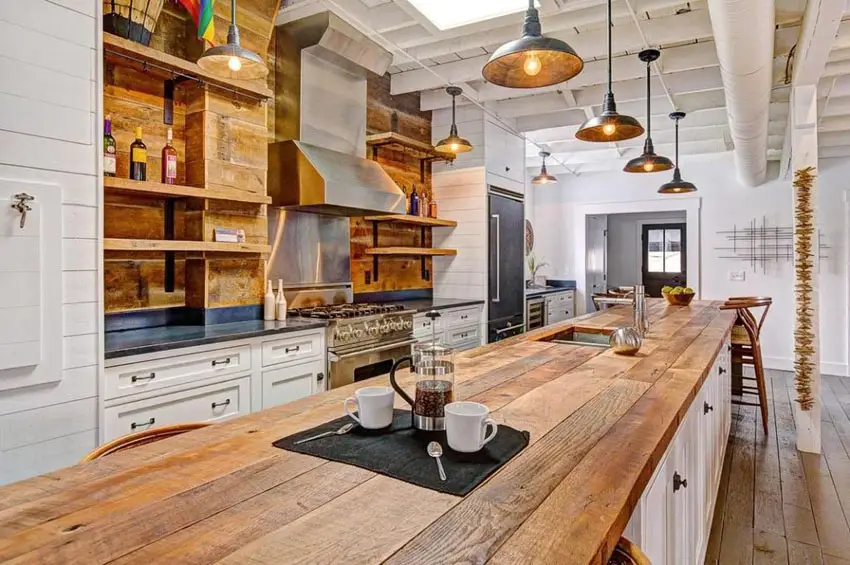 Kitchen with wooden breakfast nook, hanging shelves and white wooden shelves