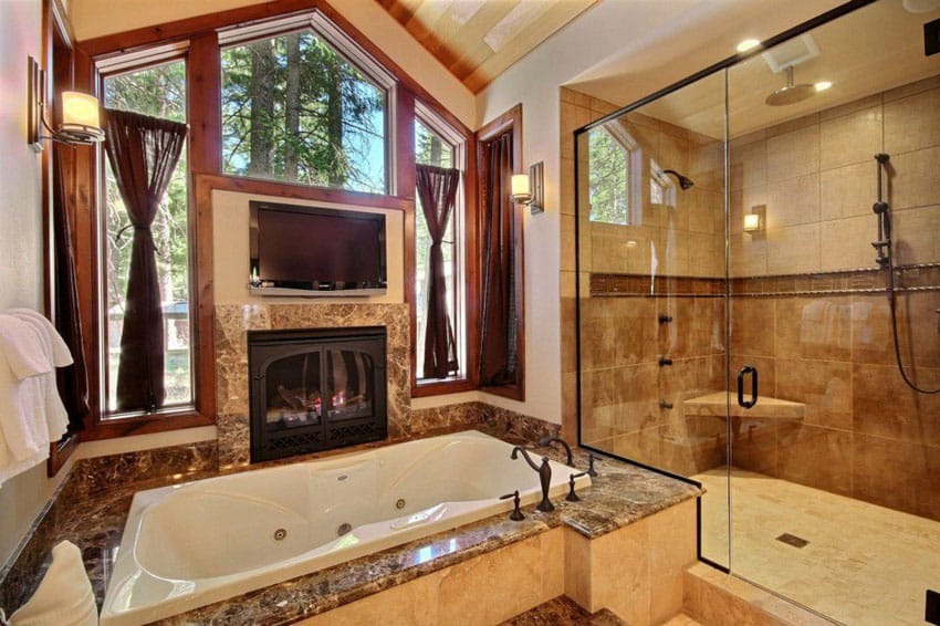 Craftsman master bathroom with whirlpool bathtub, fireplace and cathedral ceilings