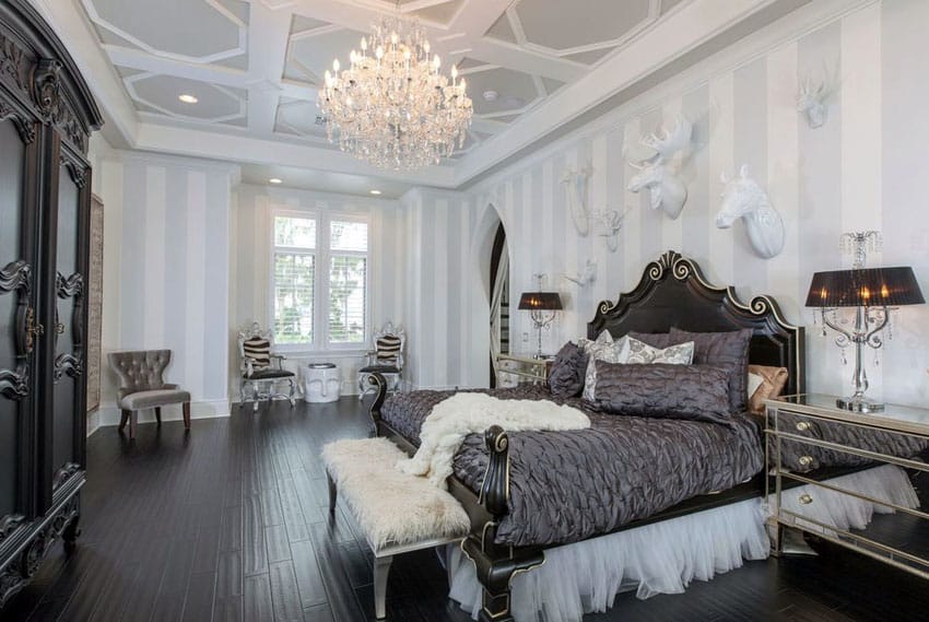Eclectic luxury bedroom with dark wood floors and silver furniture pieces