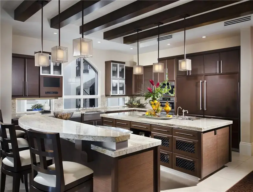Dark high gloss foil cabinets, breakfast bar and mini pendant lights 