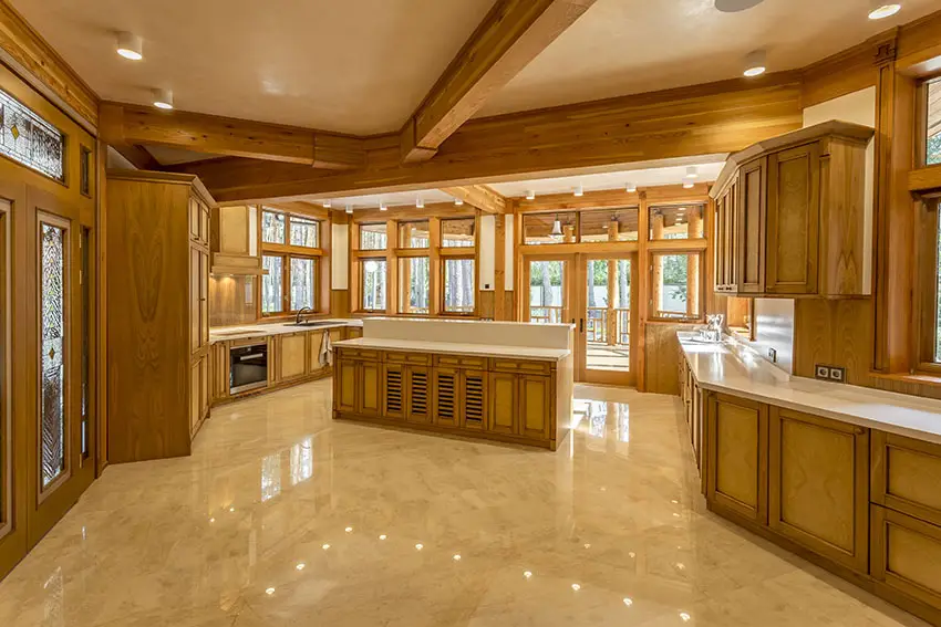 Kitchen with matte laminate wood cabinets, polished marble floors and flush ceiling lights