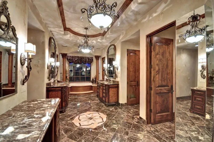 Luxury craftsman master bathroom with emperador dark marble counters