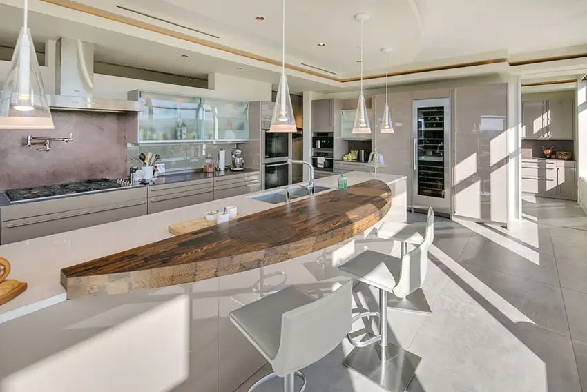Kitchen with rustic wood curved island with white high gloss cabinet