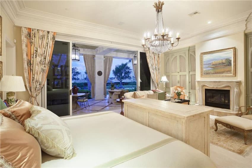 Traditional master bedroom with empire basket chandelier and cream decor