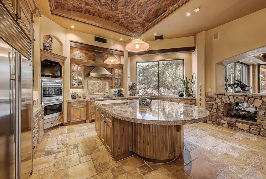 Traditional rustic kitchen with santa cecelia granite and tuscany chateaux travertine floor tile