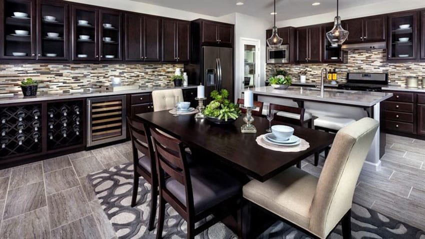 Transitional kitchen with dark cabinets dining island and l shape design